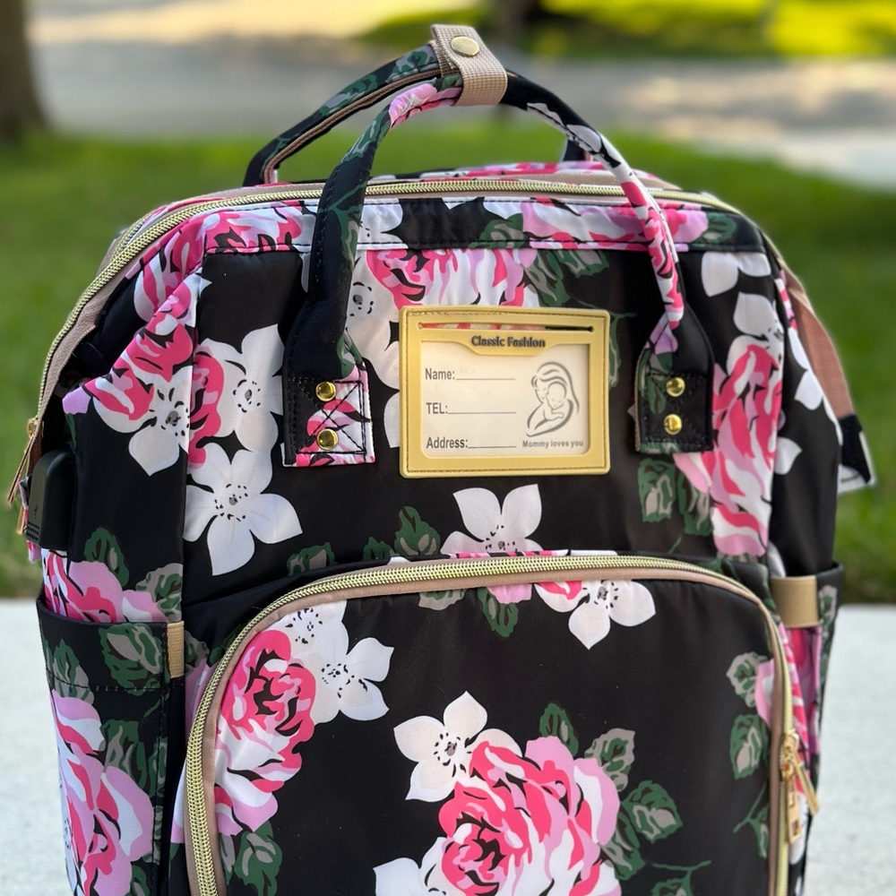 Motababy Diaper Backpack with Portable Bassinet